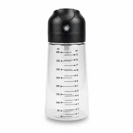 Syrup dispenser bottle showing measurement markings on clear container