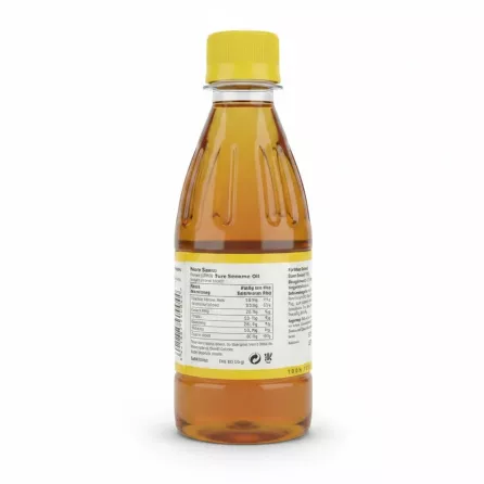 Back view of Niharti Pure Sesame Oil showing nutritional and allergy information