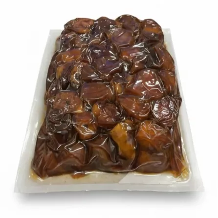 Close-up of shiny, fresh Halalo Premium Dates in packaging