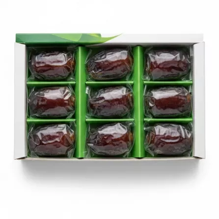 Seven individually wrapped Ajwa dates inside the box