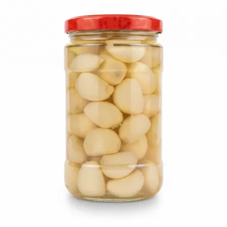 Jar of pickled peeled garlic cloves with red lid and pink label