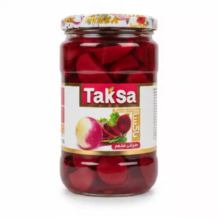 Jar of Taksa Turnip Pickle with vibrant red slices inside