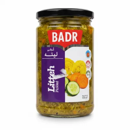 Jar of Badr Pickled Litteh mix with cucumbers, cauliflower, and carrots on a white background