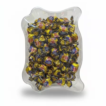 Clear container with individually wrapped Nidan Toffees filled with chocolate