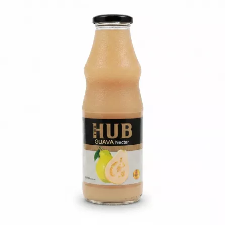 Glass bottle of The HUB Guava Nectar showing front label