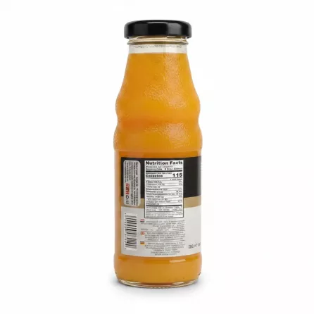 Back view of The Hub Mango Nectar bottle with nutrition facts and barcode
