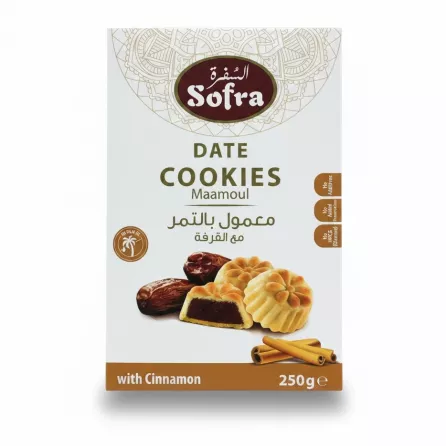 Hand holding box of Sofra Date Cookies Maamoul with detailed front view