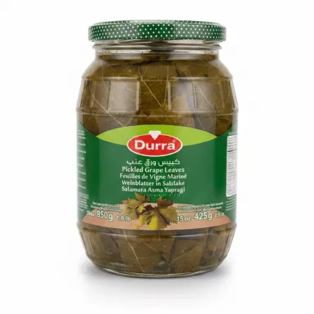 Jar of Durra Pickled Grape Leaves on wooden table