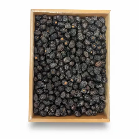 Box filled with dark, plump Ajwa dates