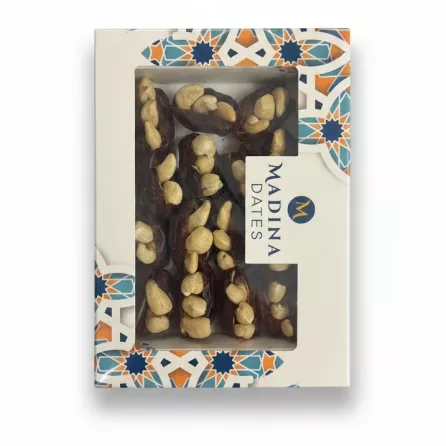 Box of Madina dates topped with cashew nuts