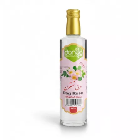 Bottle of Donya Dog Rose Distilled Water with pink label and golden cap