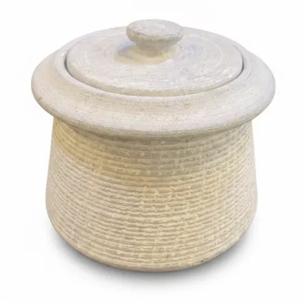 Traditional textured clay storage jar with lid