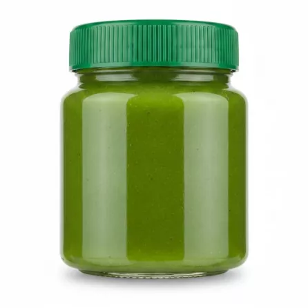 Side view of Donya Kiwi Paste jar showing green paste inside