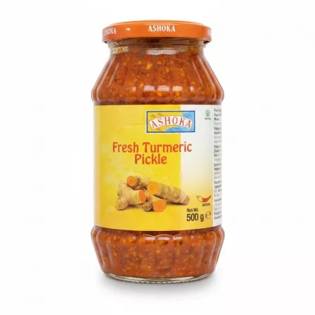Jar of Ashoka Fresh Turmeric Pickle with orange lid and yellow label