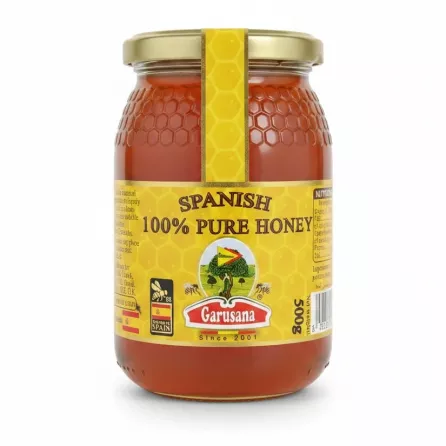 Jar of Garusana Spanish 100% Pure Honey with yellow label and gold lid