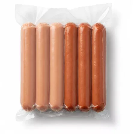 Open pack showing rows of chicken and turkey hot dogs inside
