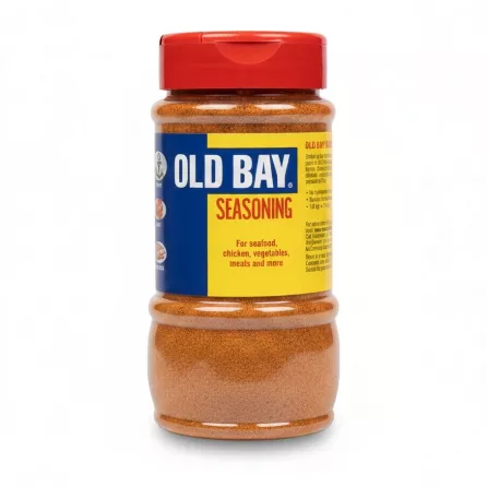 Old Bay Seasoning jar with red lid and blue-yellow label showing front