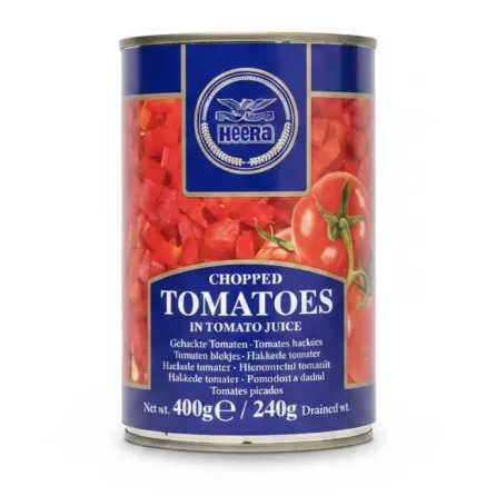 Can of Heera chopped tomatoes in tomato juice with blue label