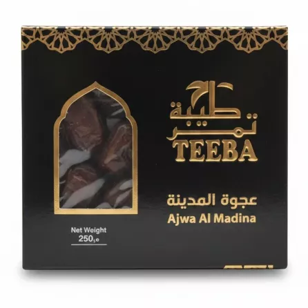 Box of Teeba Ajwa Al Madina Dates in black packaging with gold decorative elements