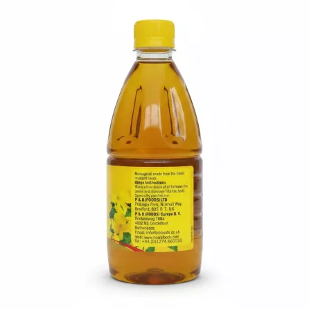 Back label of Heera Pure Mustard Oil showing usage instructions and company details