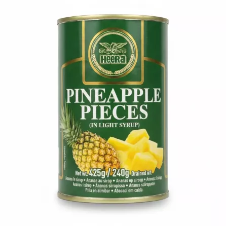 Heera brand can of pineapple pieces in light syrup showing front label