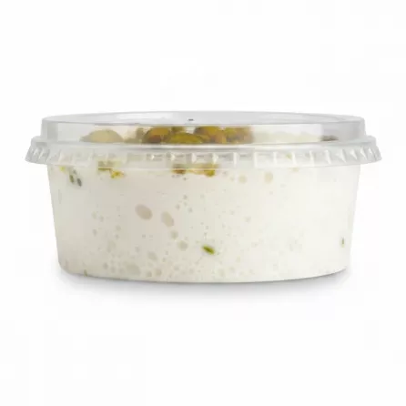Side view of 4 Seasons Traditional Pistachio Ice Cream tub showing texture