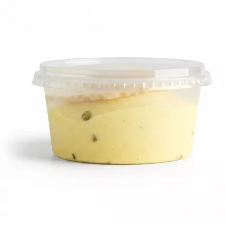 Side view of 4 Seasons saffron pistachio wafer ice cream in plastic container