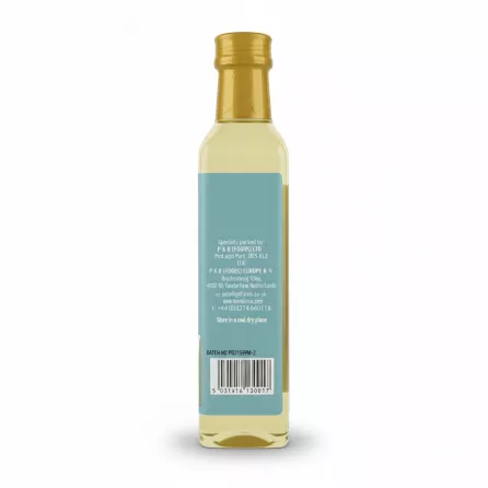 Back label of Heera Castor Oil bottle with storage and contact info