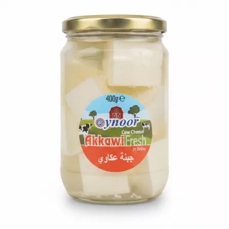 Glass jar of @ynoor Akkawi fresh cow cheese in brine with label visible