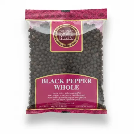 Heera brand pack of whole black peppercorns visible through packaging
