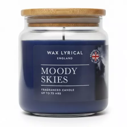 Wax Lyrical Moody Skies fragranced candle in clear glass jar with bamboo lid showing front label