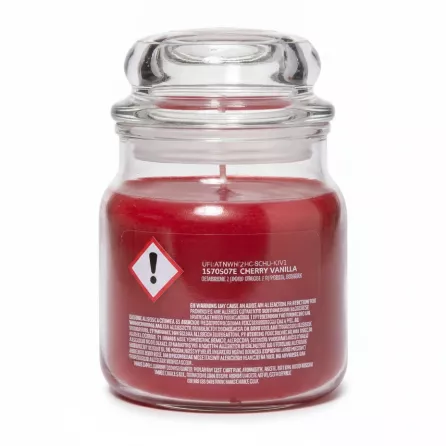 Back of Yankee Candle jar with hazard warning and ingredient text