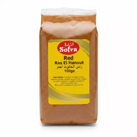 Packaged red Ras El Hanout spice blend in a transparent plastic bag with yellow label