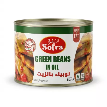 Enhanced Hand holding Sofra Green Beans in Oil can, front label visible