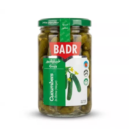 Enhanced Front view of Badr Cucumbers In Brine (Midget) jar on supermarket shelf