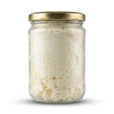 Enhanced Side view of full Yayla Erzincan Tulum Peyniri cheese jar