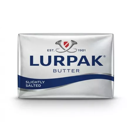 Enhanced Lurpak Slightly Salted Butter 200g held in hand top front view