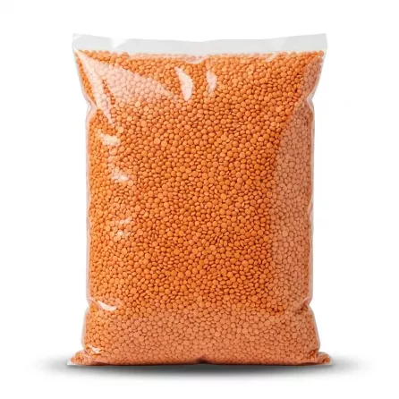 Enhanced Large clear plastic bag of red split lentils, 5kg, on a shelf