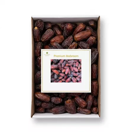 Enhanced Box of Madina Dates Premium Mabroom with clear lid, showing whole dates inside