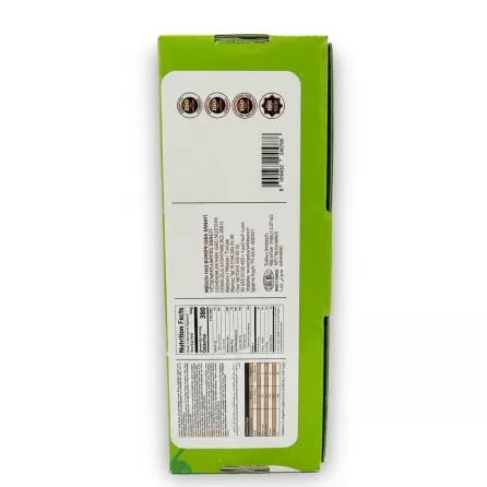 A professional 1:1 e-commerce product photograph showing the back of the Mogida Date Maamoul box. The green box is centered, filling 85% of the frame against a clean white background, with crisp detail on all label information, including 'Nutrition Facts', ingredients, company details, quality logos, and the barcode. Soft, equal side shadows create depth.