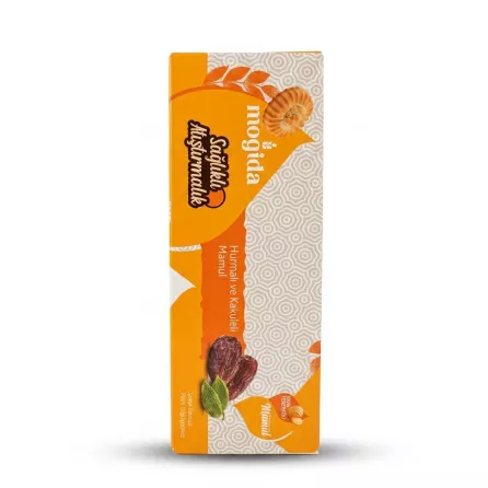Enhanced Box of Mogida Dates & Cardamom Maamoul held in store aisle