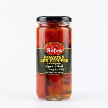 Enhanced Front of Sofra Roasted Red Peppers jar held in hand in supermarket aisle