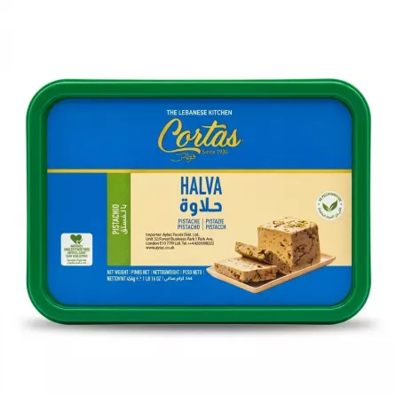 A top-down studio photograph of a Cortas Pistachio Halva 454g tub with a blue label and green border, featuring images of sliced halva.