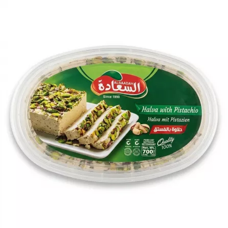 Enhanced Alsadadh Halva with Pistachio 700g container held in hand, front label visible