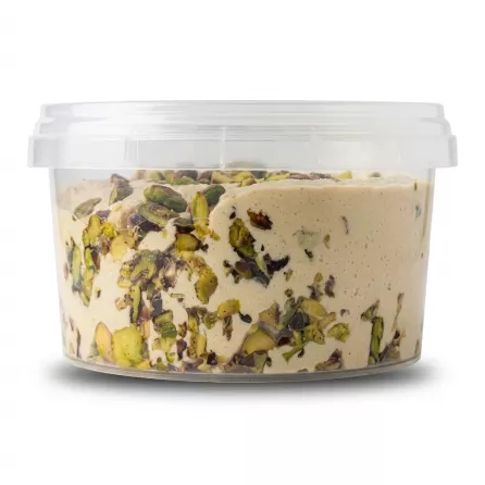 Enhanced Side view of Safa Halawa Pistachios showing nut-packed contents inside clear tub