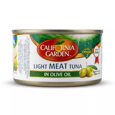 Enhanced A can of California Garden Light Meat Tuna in Olive Oil held in hand in a grocery store aisle