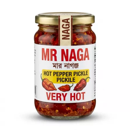 Enhanced Front label of Mr Naga Hot Pepper Pickle Very Hot jar held in hand
