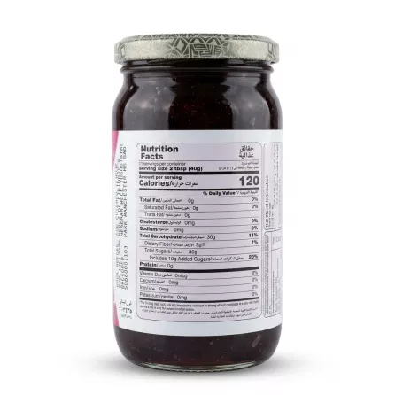 A 1:1 professional e-commerce product photograph featuring a centered, glass jar of Ahmed Rose Petal Spread, clearly displaying the bilingual (English and Arabic) Nutrition Facts label against a clean, white, studio background with a soft, symmetrical shadow. PRODUCT TITLE: Ahmed Rose Petal Spread PRODUCT: Nutrition facts label of Ahmed Rose Petal Spread jar PREFERENCES: - Aspect ratio: 1:1 A perfectly centered, high-resolution, professional e-commerce studio photograph of a single glass jar of Ahmed Rose Petal Spread, presented on a flawless white background. The jar, which appears full of dark, rose-petal preserve, is isolated and fills approximately 85% of the 1:1 frame. All background elements from the original supermarket setting, including the person’s hand, watch, clothing, and shelving, are completely removed. The jar is positioned with the complex "Nutrition Facts" label (as seen in image_0.png) facing directly forward and in sharp, legible focus. This label details, in both English and Arabic, specific information like "Serving size 2 tbsp (40g)," "Calories 120," "Total Fat 0g," "Total Carbohydrate 30g," "Protein 0g," and "Sodium 0mg," along with the percent Daily Value. The label's appearance, including all specific text and formatting, is meticulously preserved and cleaned of all imperfections. The text is crisp and easily readable. The glass jar itself is pristine and free of dust, fingerprints, or labels on other surfaces (the small remnants at the bottom edge of the label have been cleaned up). The patterned foil cap at the top is clean and sharp. The entire jar is uniformly and professionally lit with a soft-box studio lighting setup, eliminating harsh shadows and reflections. A subtle, soft, symmetrical shadow is present beneath the base of the jar, grounding it and keeping equal visual weight on both sides. The product appears tactile and clean, with the texture of the spread inside visible through the clear glass areas. The overall image is balanced and high-quality, typical of a top-tier online retailer listing.