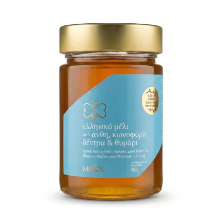Enhanced Minos Greek honey jar with blue label front view