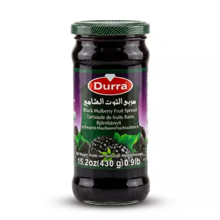 A 430g jar of Durra Black Mulberry Fruit Spread, with its clear label showing the brand name and images of mulberries, is centered against a clean white background. PRODUCT TITLE: Durra Black Mulberry Fruit Spread 430g Jar PROCESSED PRODUCT IMAGE: